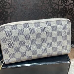Louis Vuitton Azure large Organizer Wallet Full zip. Comes with a COA